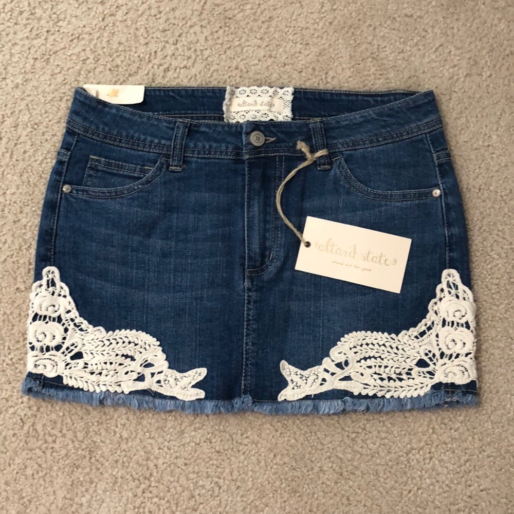 Mini jean skirt.NWT. Size 27/5.Altar’d State brand